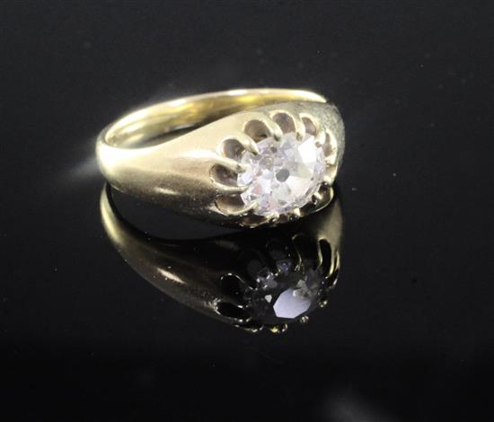 A late 19th/early 20th century gold and claw set solitaire diamond ring, size K.